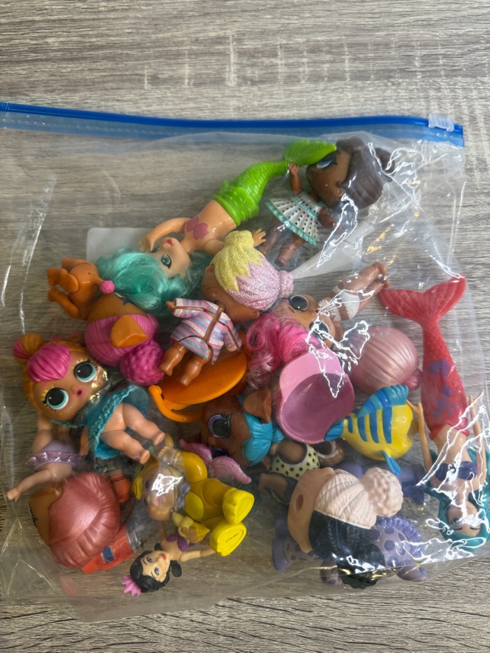 L.O.L. Surprise! Doll Lot with Pink, Green, Blue & Yellow Accessories